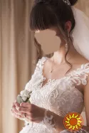 весільну сукню