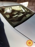 Наклейки на авто Мяч футбольный белый в окне авто наклейка прикол