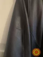 Чёрное кожаное женское пальто