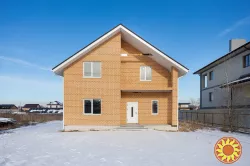 Продається сучасний двоповерховий котедж із критою терасою