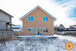 Продається сучасний двоповерховий котедж із критою терасою