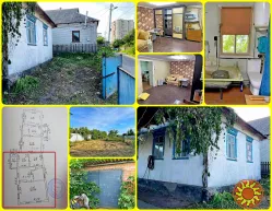 Продам полдома в Центре.