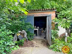 Продам полдома в Центре.