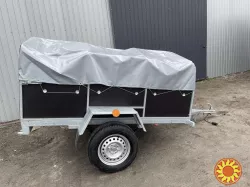 Новий причіп 200х130х40 з оцинкованою рамою та з бакеліту!