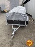 Новий причіп 200х130х40 з оцинкованою рамою та з бакеліту!