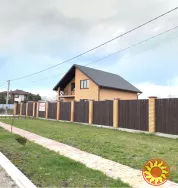 Продається сучасний двоповерховий котедж із критою терасою