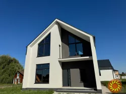 Сучасний барнхаус під Києвом із двома терасами та власною атмосферою