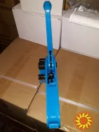 Обладнання для затягування вантажу на піддоні, палеті. Натягувач