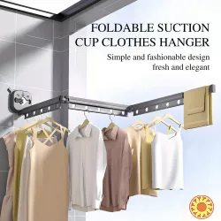 Телескопічна металева сушарка для одягу.