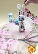 Заєць, в'язана іграшка ручної роботи