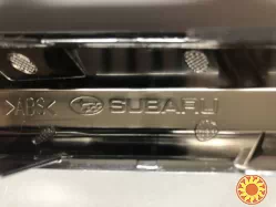 57708SG010 Subaru Forester заглушка бампера переднего левый хромовый