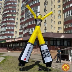 Аеромен вивіска магазину каварні