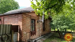 Затишний будинок із просторою ділянкою в районі Гречани!