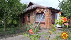 Затишний будинок із просторою ділянкою в районі Гречани!