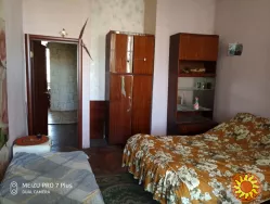 Сдам комнату с балконом в 3-ком.коммуне на ул.Ольгиевской.