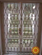 Розсувні решітки для вікот та дверей