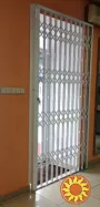 Розсувні решітки для вікот та дверей