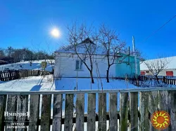 Дом с коммуникациями возле озера в Быковой Гребле.